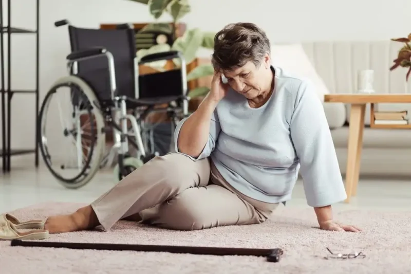 Common causes of falls in seniors including environmental hazards, physical changes, medical conditions, medications, and behavioral factors, with preventive strategies like exercise, home safety, and assistive devices.