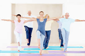 Senior practicing balance exercises such as heel to toe walking and single leg stands to improve stability and prevent falls.